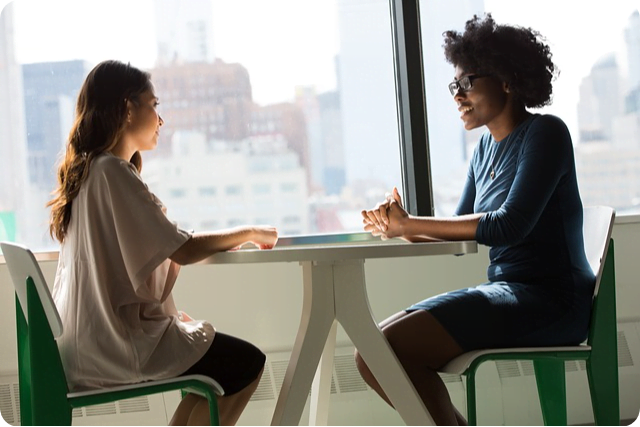 Two people meeting at a business event