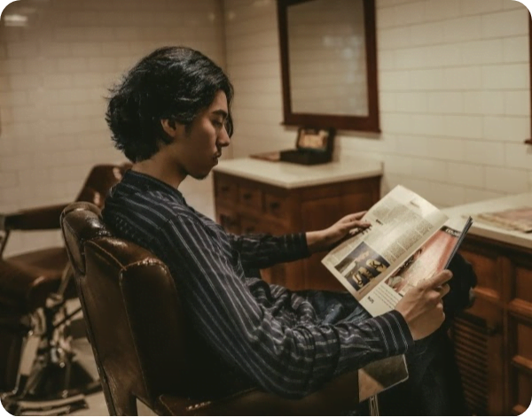 Sales rep reading trade show manual