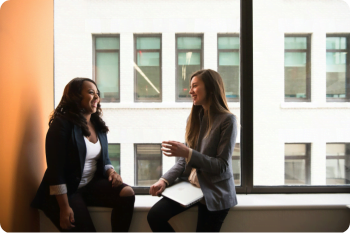 Two business people meeting at an event