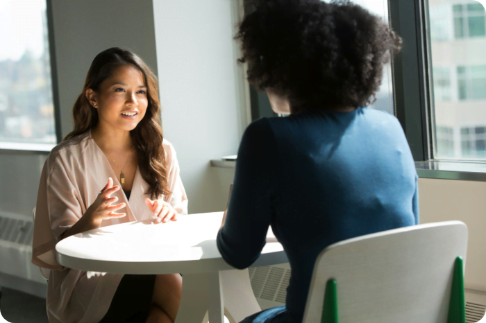 Salesperson discussing business with a lead